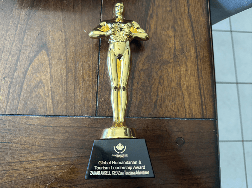 Award trophy symbolizing Zainab Ansell’s Global Humanitarian & Tourism Leadership recognition at the Canada Legacy Honours 2025, celebrating excellence in tourism and humanitarian service.